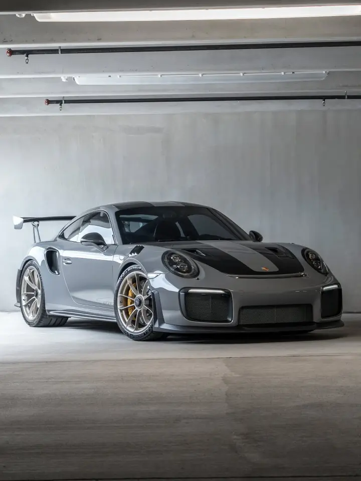 Porsche performance car in a garage